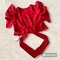 Blusa roja con mangas bombachas image