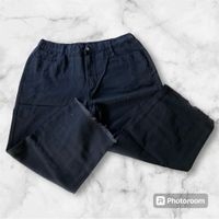 Pantalones negros de mezclilla image