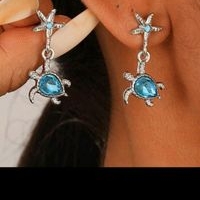 Pendientes colgantes de tortuga
Aleación de Zinc image