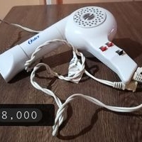Secador de pelo Oster compacto image