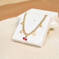 Collar Dorado con Dijes image