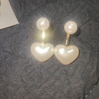 Elegantes aretes de perlas image