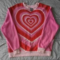 Suéter de corazones vibrante image