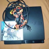Consola PS3 con control y juego image