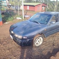 Mitsubishi elegant año 94 motor 1500 CC no tengo la firma está en naranjo tienen que contactar pero camina bien u está al día con marchamo y deckra información al 71907875 image