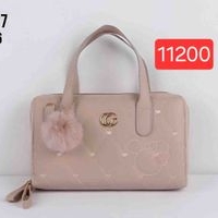 Bolso elegante con pompon image