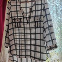 Blusa a cuadros elegante image