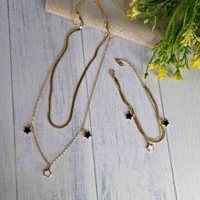 Set de collar y pulsera con estrellas image