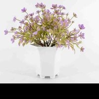 Mini helecho artificial con flor violeta image