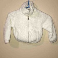 Chaqueta de felpa blanca para niño image
