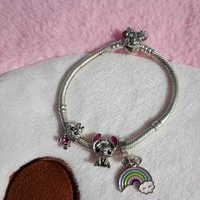 Pulsera con dijes de fantasía, image