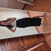 Falda larga negra con abertura marca gef talla s image