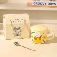 Taza con tapa y cuchara de conejo image