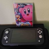 Switch lite con kirby star allies una SD de 128gb y cargador image